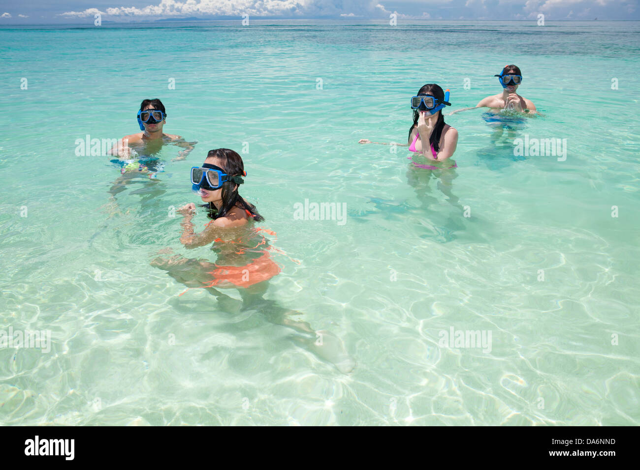 Friends snorkeling together. Stock Photo