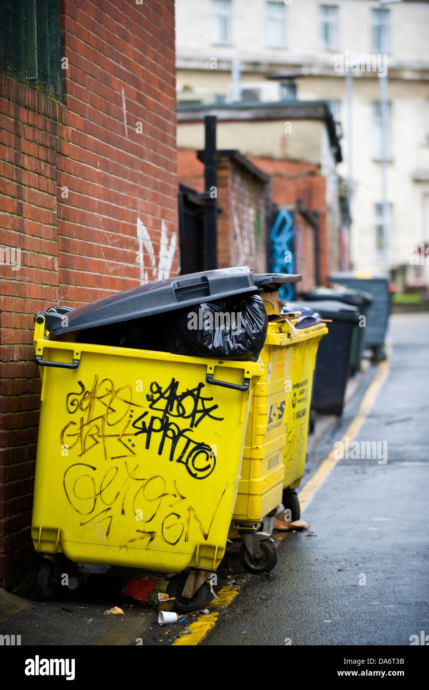 Commercial rubbish wheelie bins on back alley in Leeds West Yorkshire England UK Stock Photo Alamy