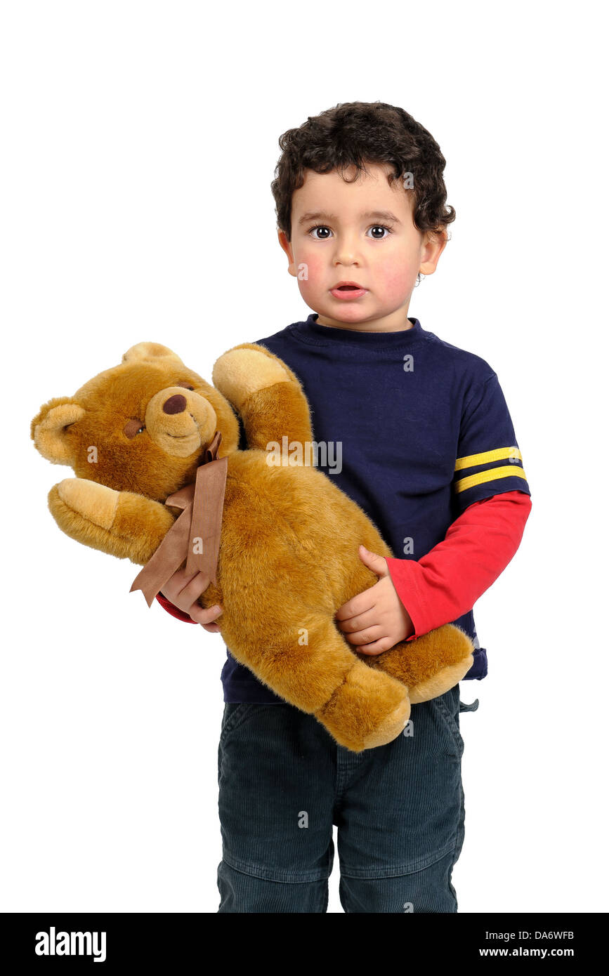 Young boy with teddy bear isolated in white Stock Photo - Alamy