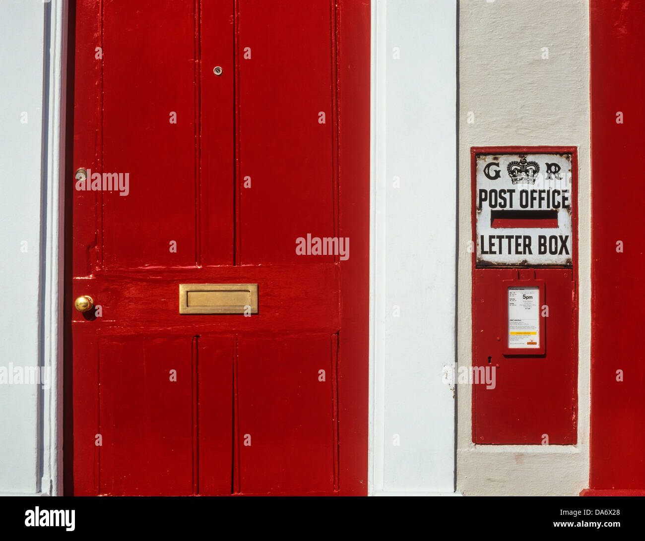 A Red Front Door And Letter Box Kimbolton Huntingdonshire Stock