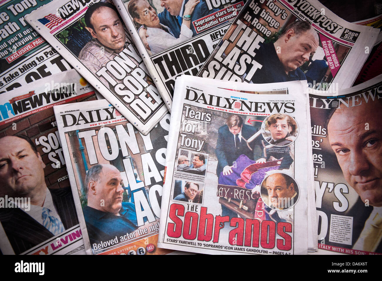 Newspapers report on the death of Sopranos star James Gandolfini of a heart attack while in Italy and his funeral. Stock Photo