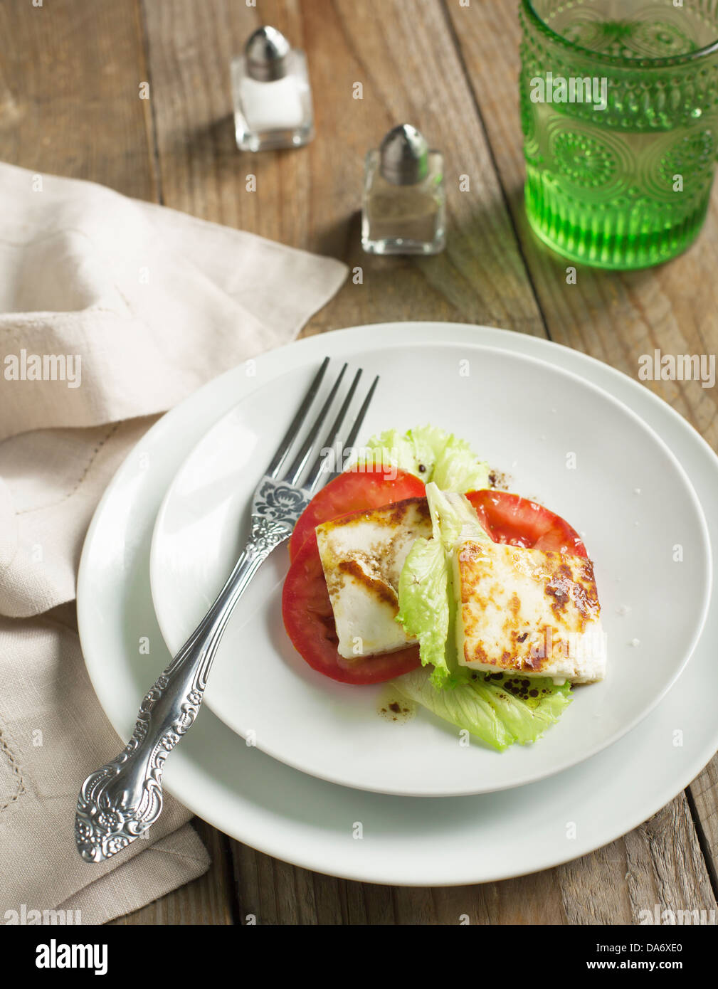 Fried Halloumi Cheese and tomato salad Stock Photo