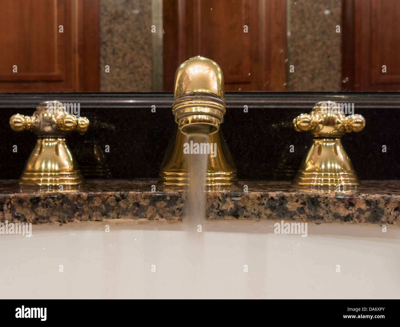 Bathroom Sink Faucet with Running Water Stock Photo