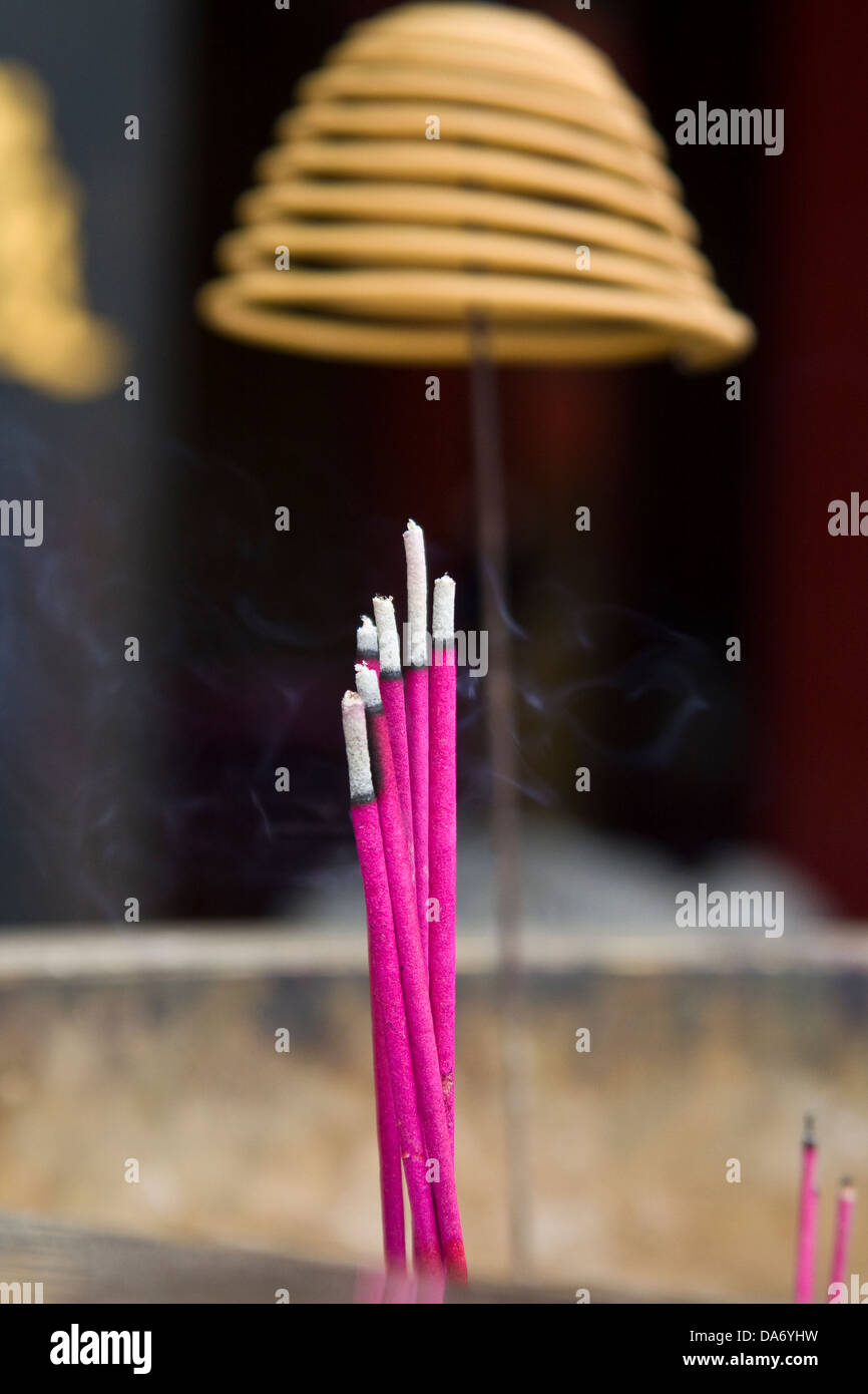 Yellow incense coils hi-res stock photography and images - Alamy