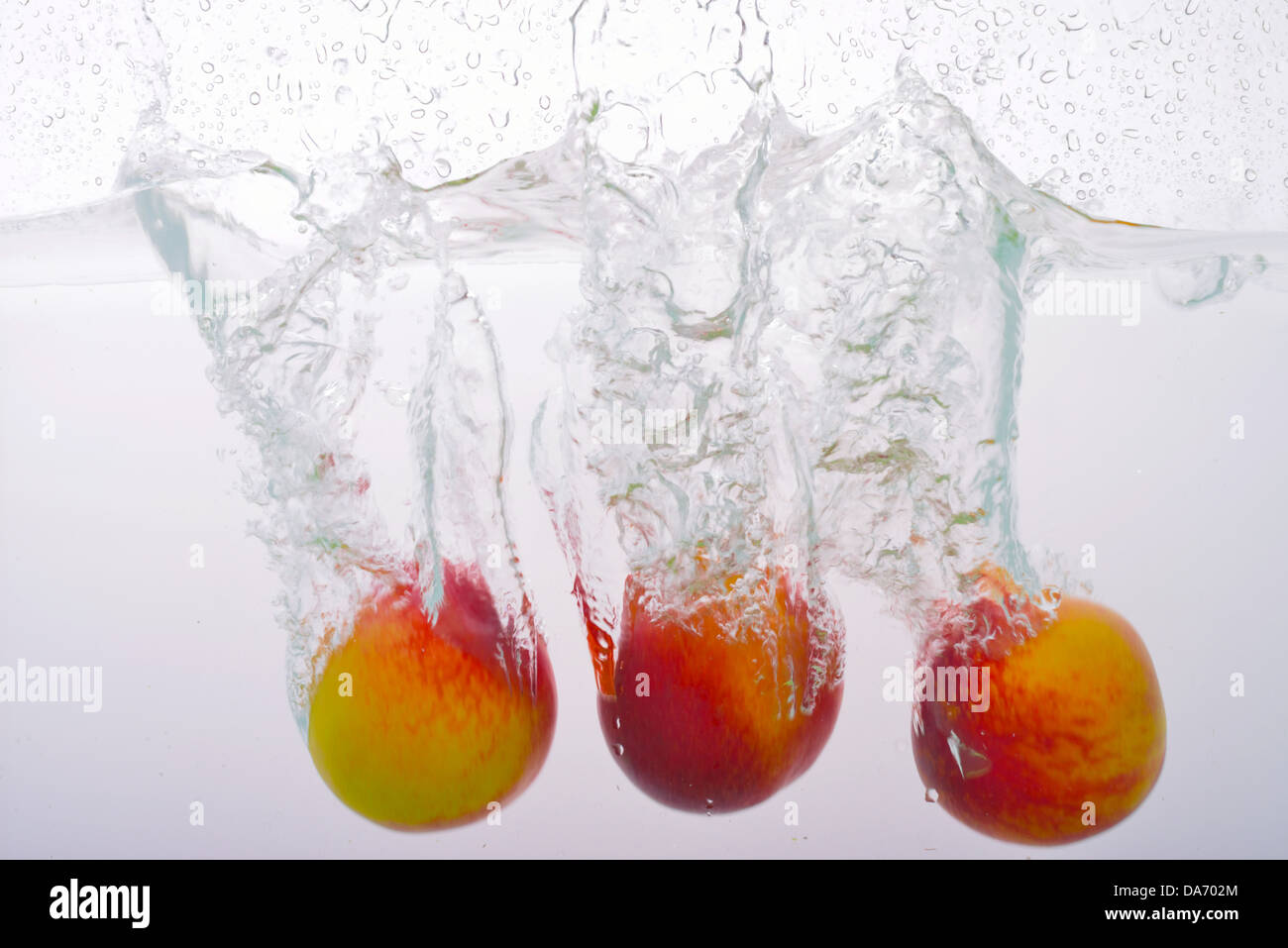 Nectarines in water Stock Photo Alamy