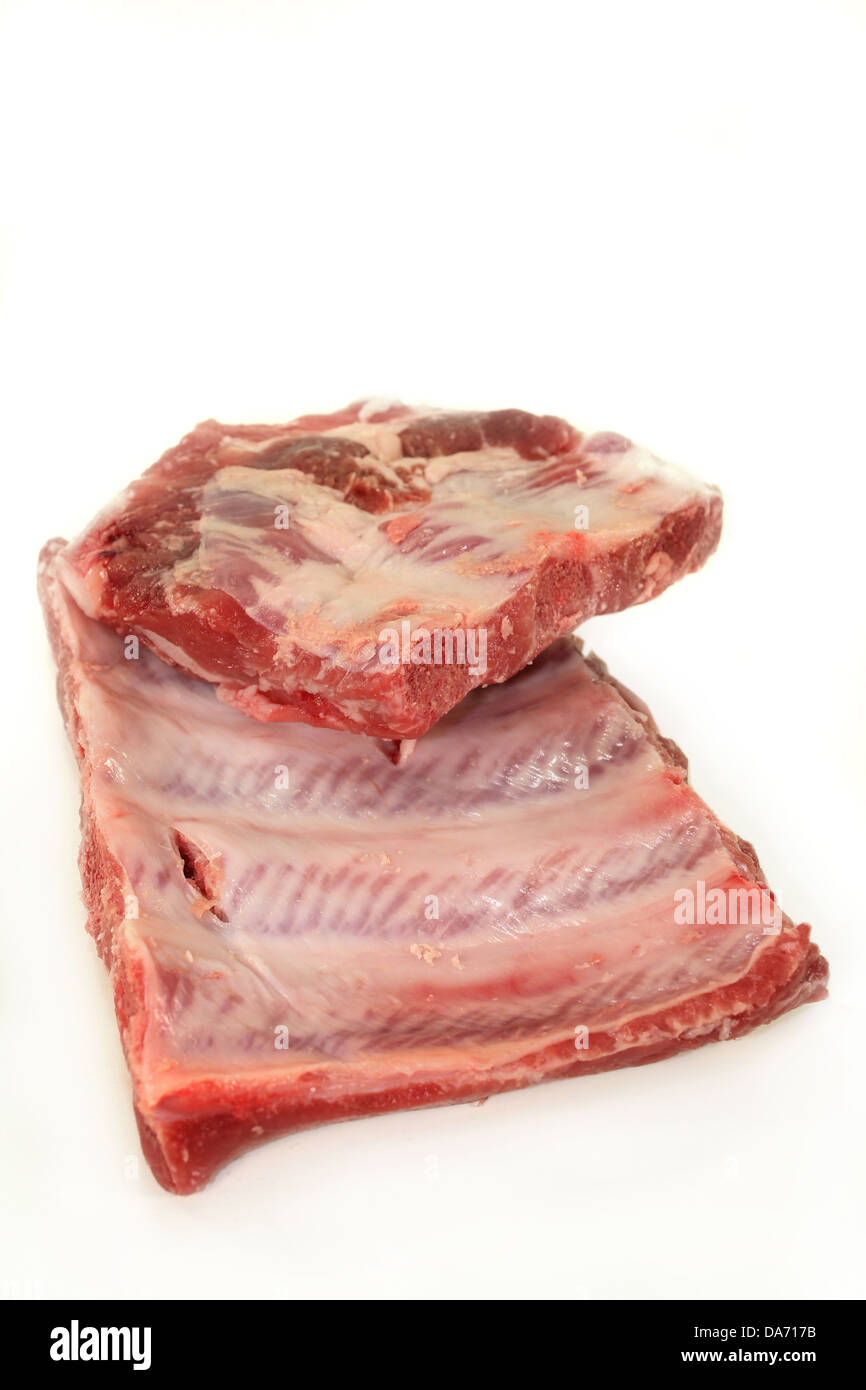 two pieces of spare ribs on a white background Stock Photo