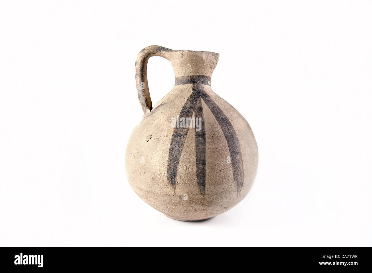 Clay old Middle Eastern jug on the white background Stock Photo