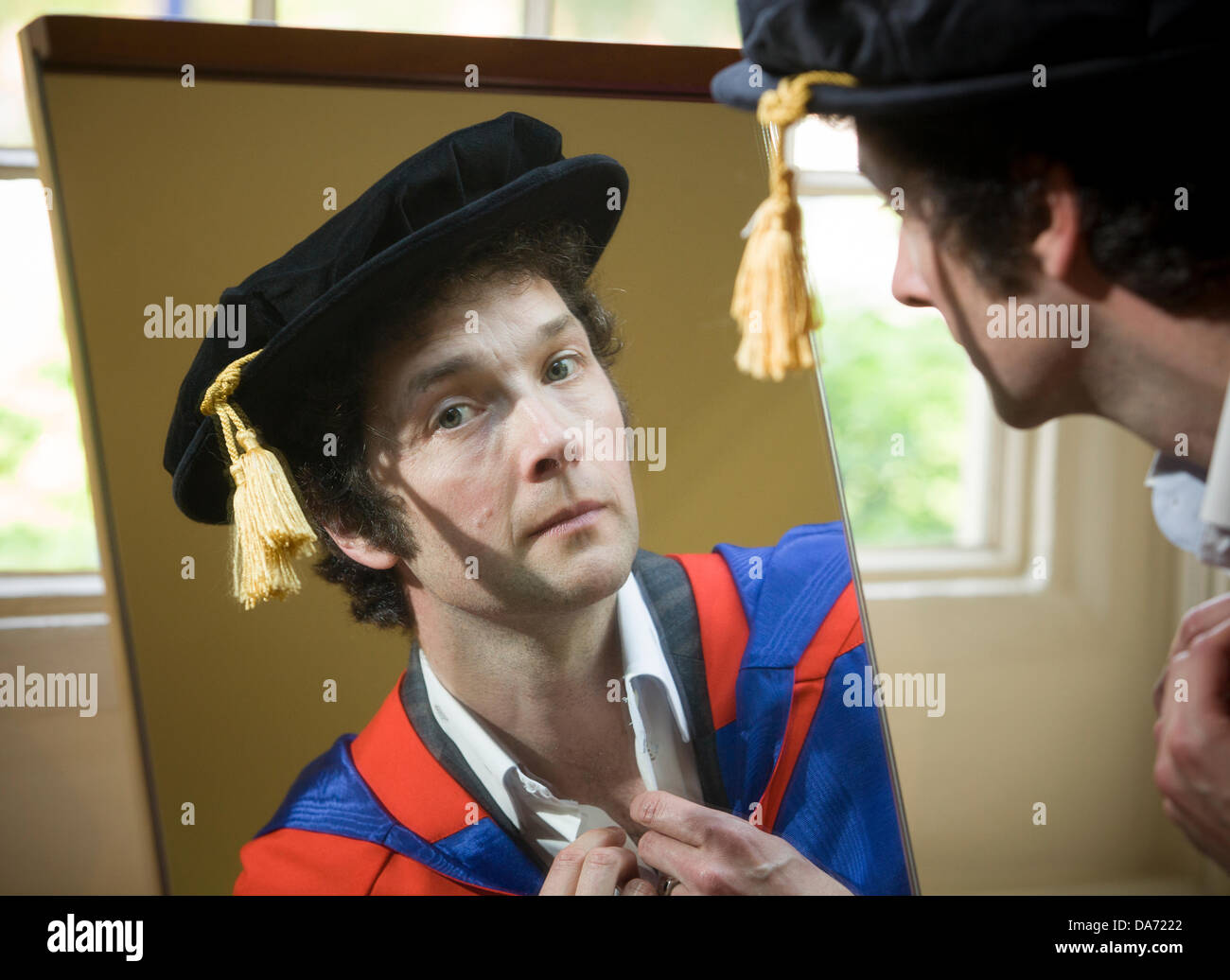 Birmingham, UK, 5th July 2013.  British comedian and actor Chris Addison in his cap and gown robes before getting an honorary degree from University of Birmingham.  Chris Addison is know for his role in Mock the Week and the TV series The Thick of It. Credit:  John James/Alamy Live News Stock Photo