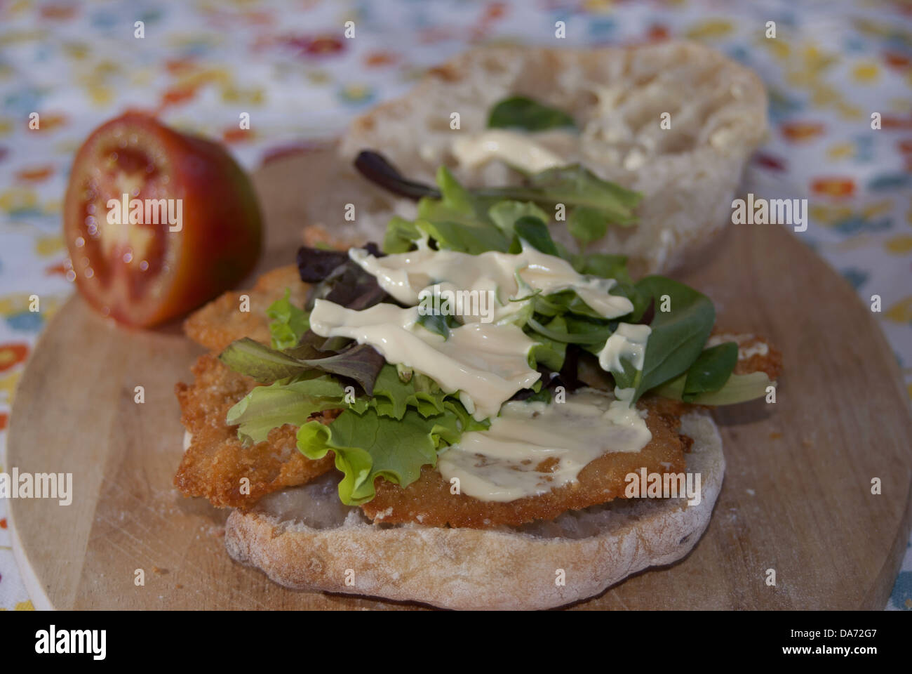 A typical Italian sandwich with chicken cutlet and mayonnaise Stock