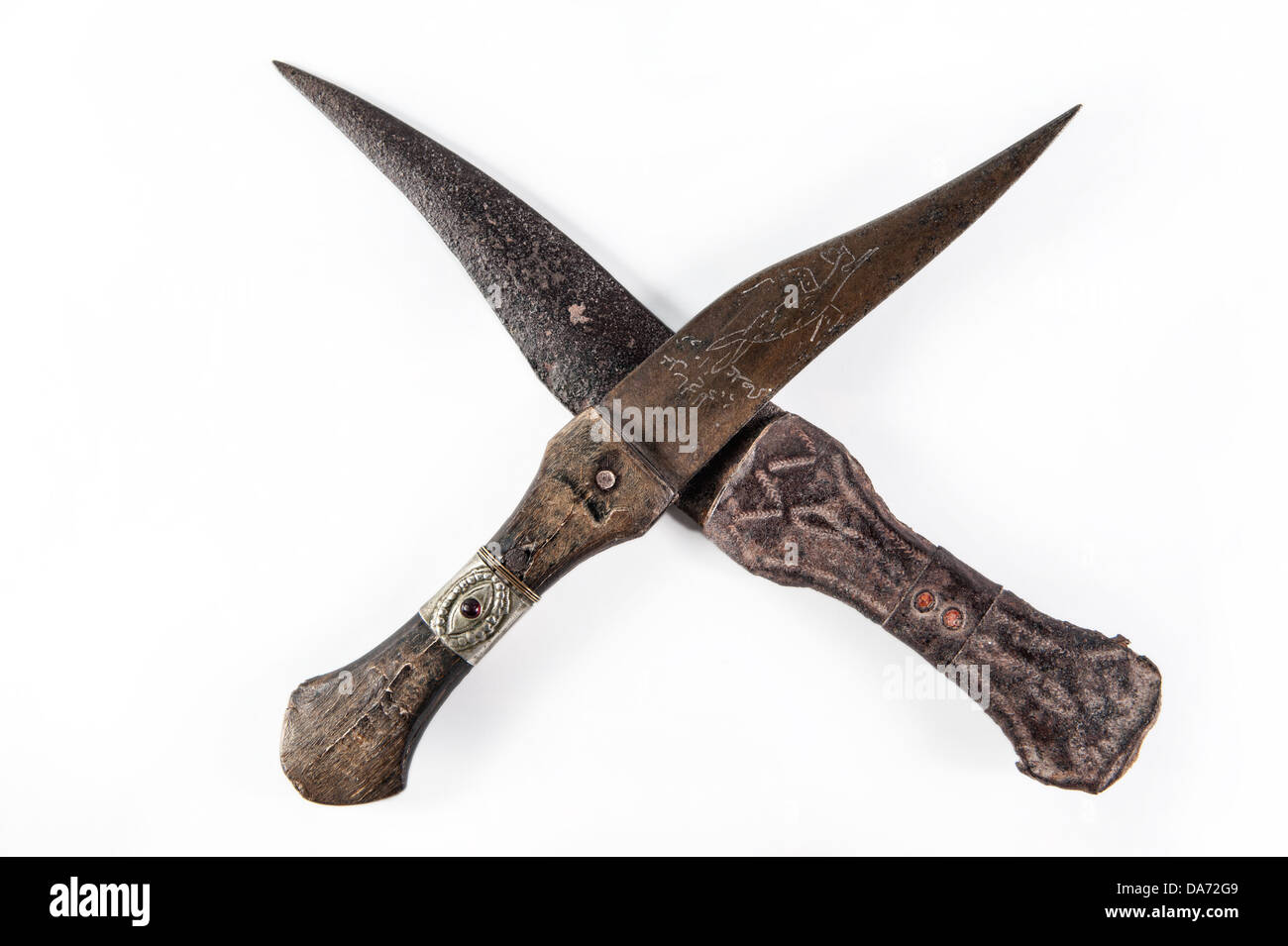 Crossed antique daggers from Ottoman Empire period, isolated Stock Photo