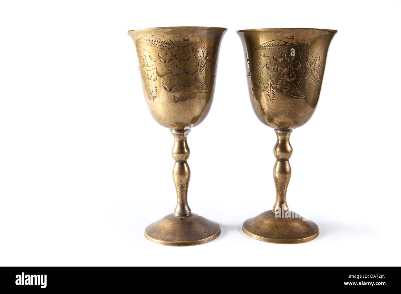 Two old bronze kiddush wine cups isolated Stock Photo