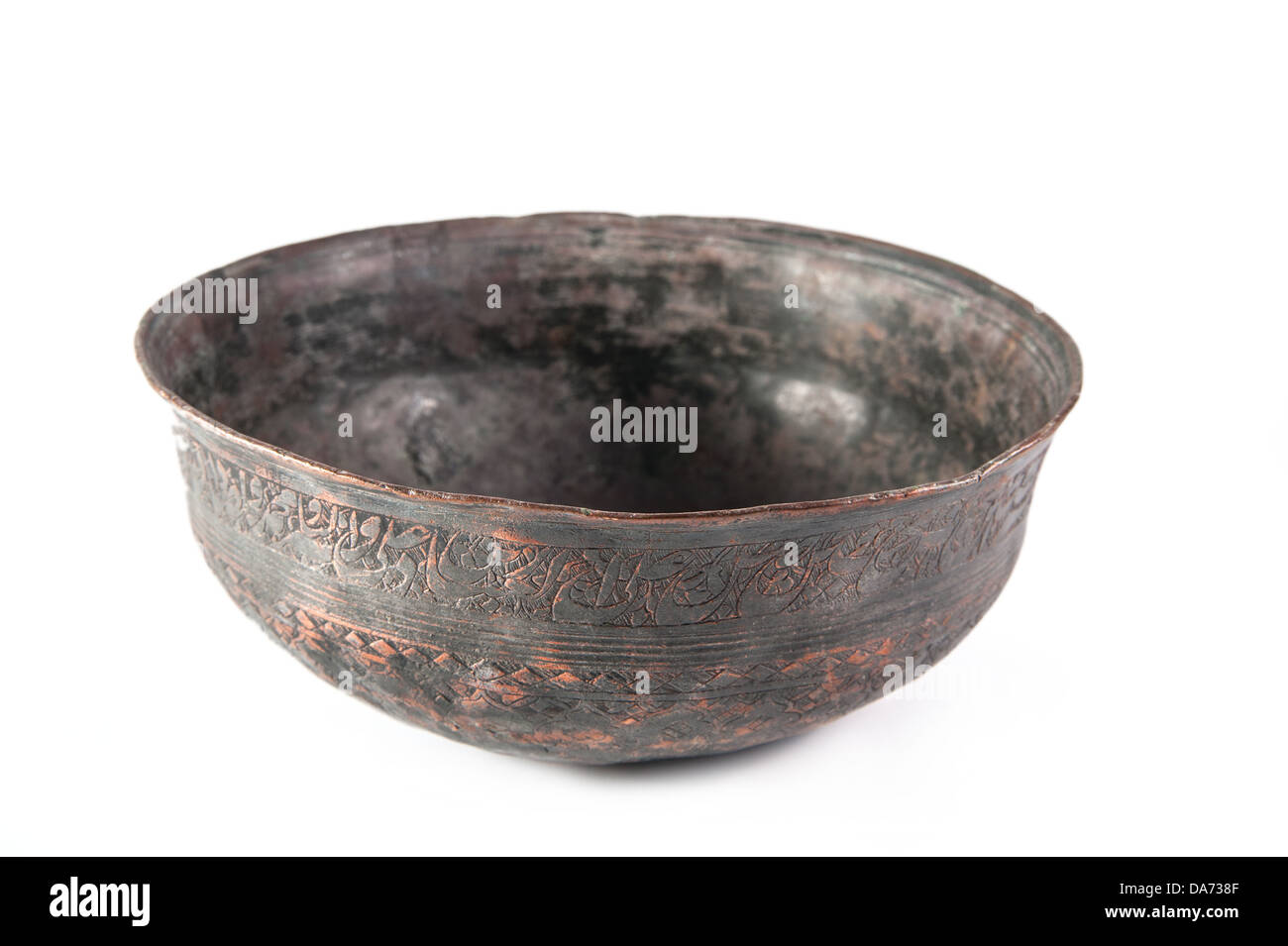 Old vintage bronze, brass bowl isolated on white background Stock Photo