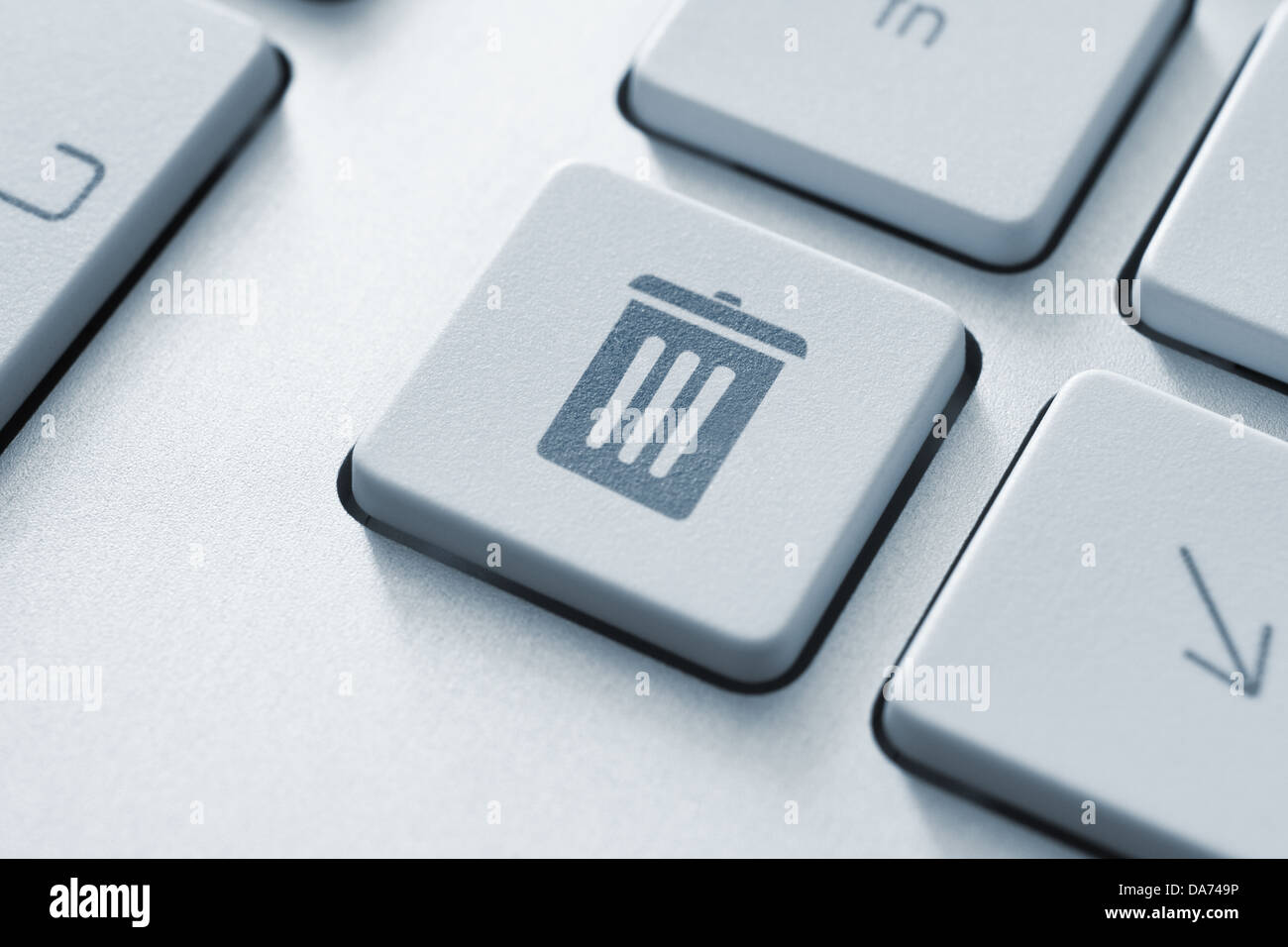 Computer button on a keyboard with recycle bin icon symbol Stock Photo