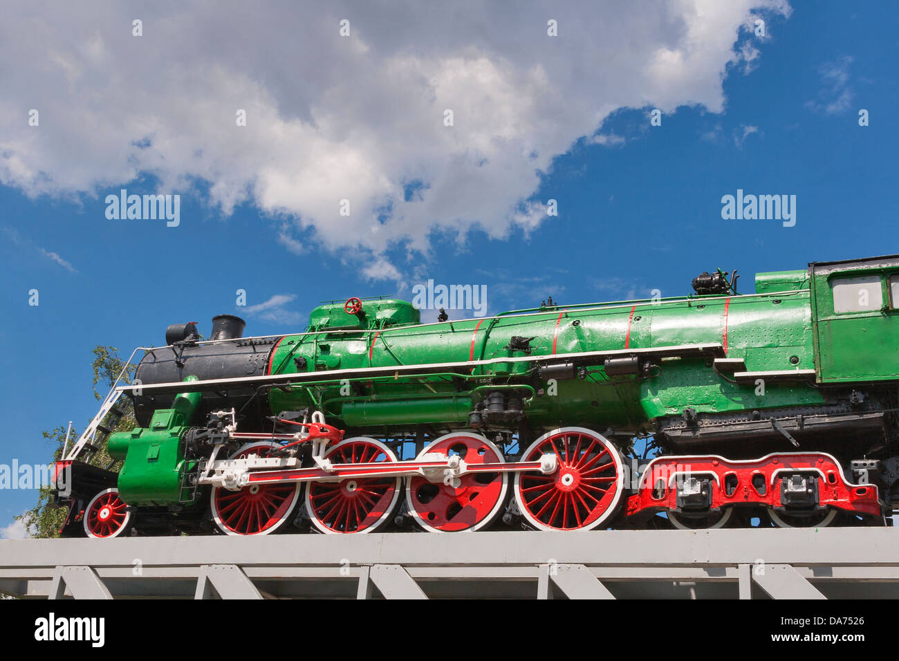 Steam vintage locomotive against blue sky Stock Photo