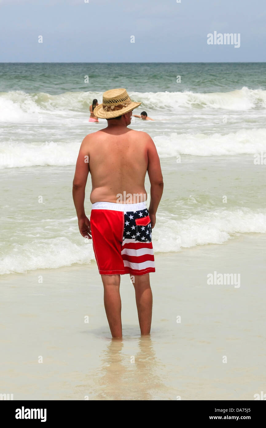Man wears a patriotic set of beach shorts on July 4th in Florida Stock  Photo - Alamy