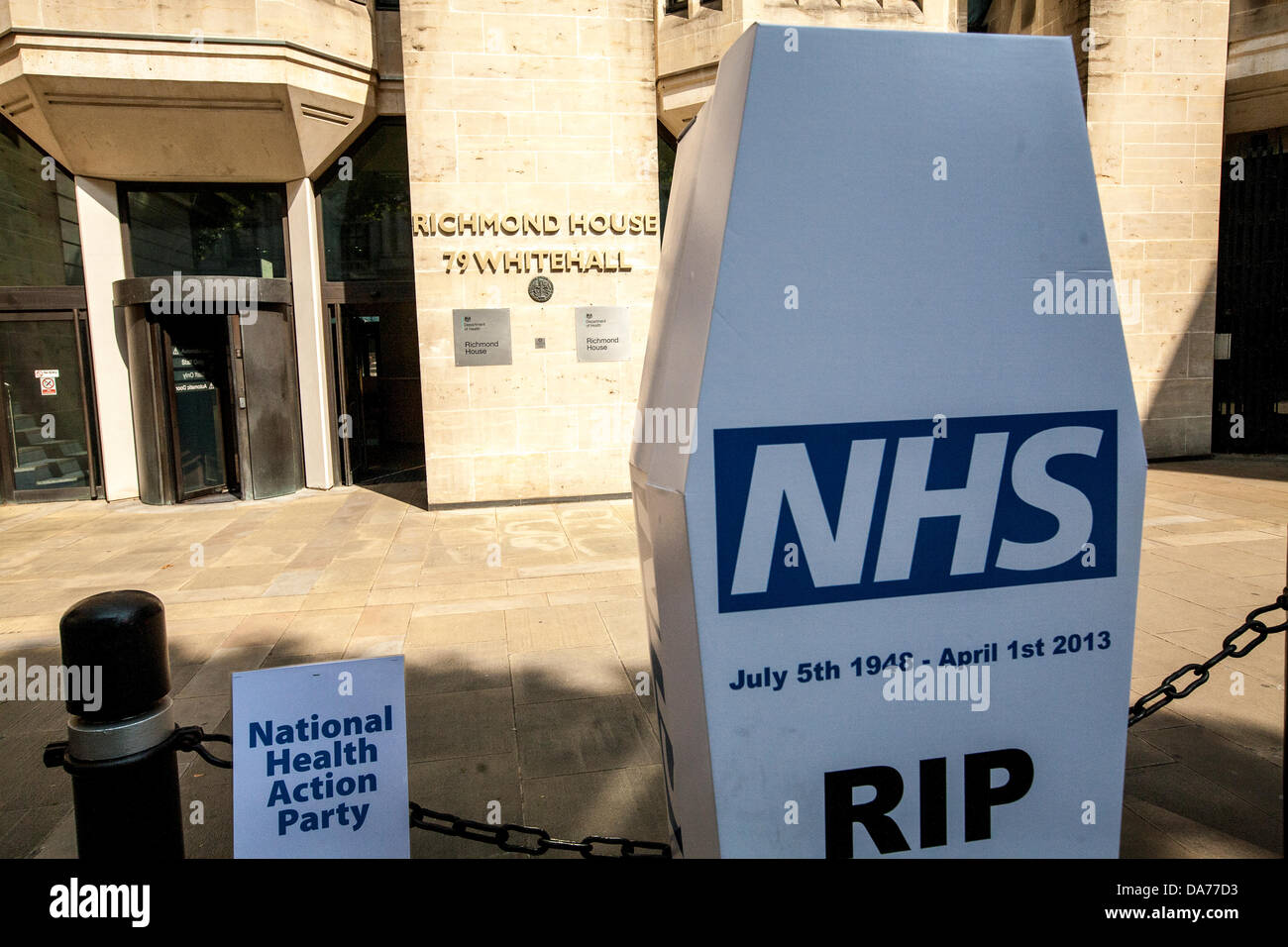 London, UK. 5th July, 2013. Coffin carried by medical staff march to Downing Street to protest privatisation NHS on the 65th anniversary of it's founding  Credit:  Mario Mitsis / Alamy Live News Stock Photo