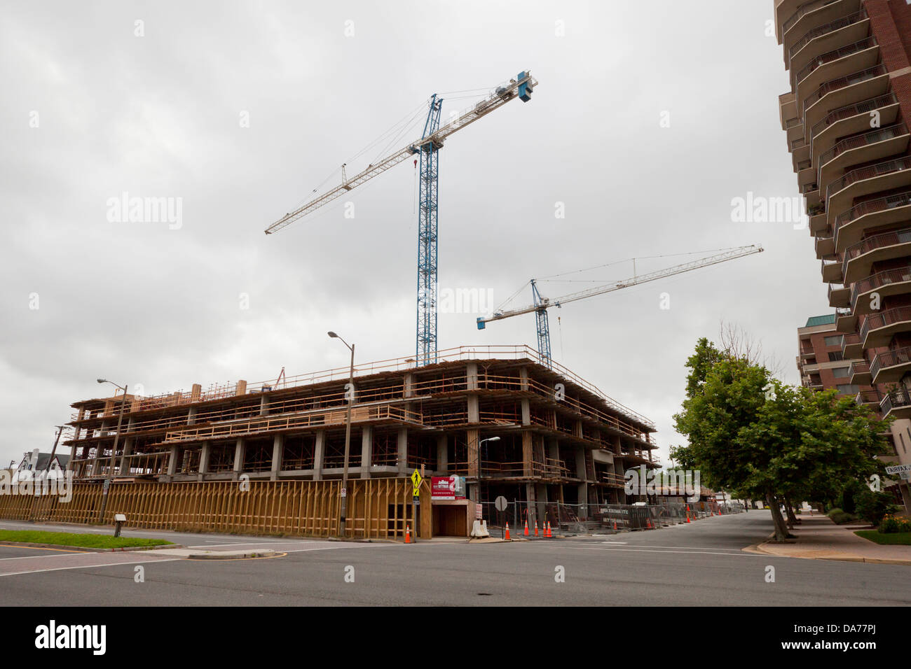 Cranes over construction site Stock Photo