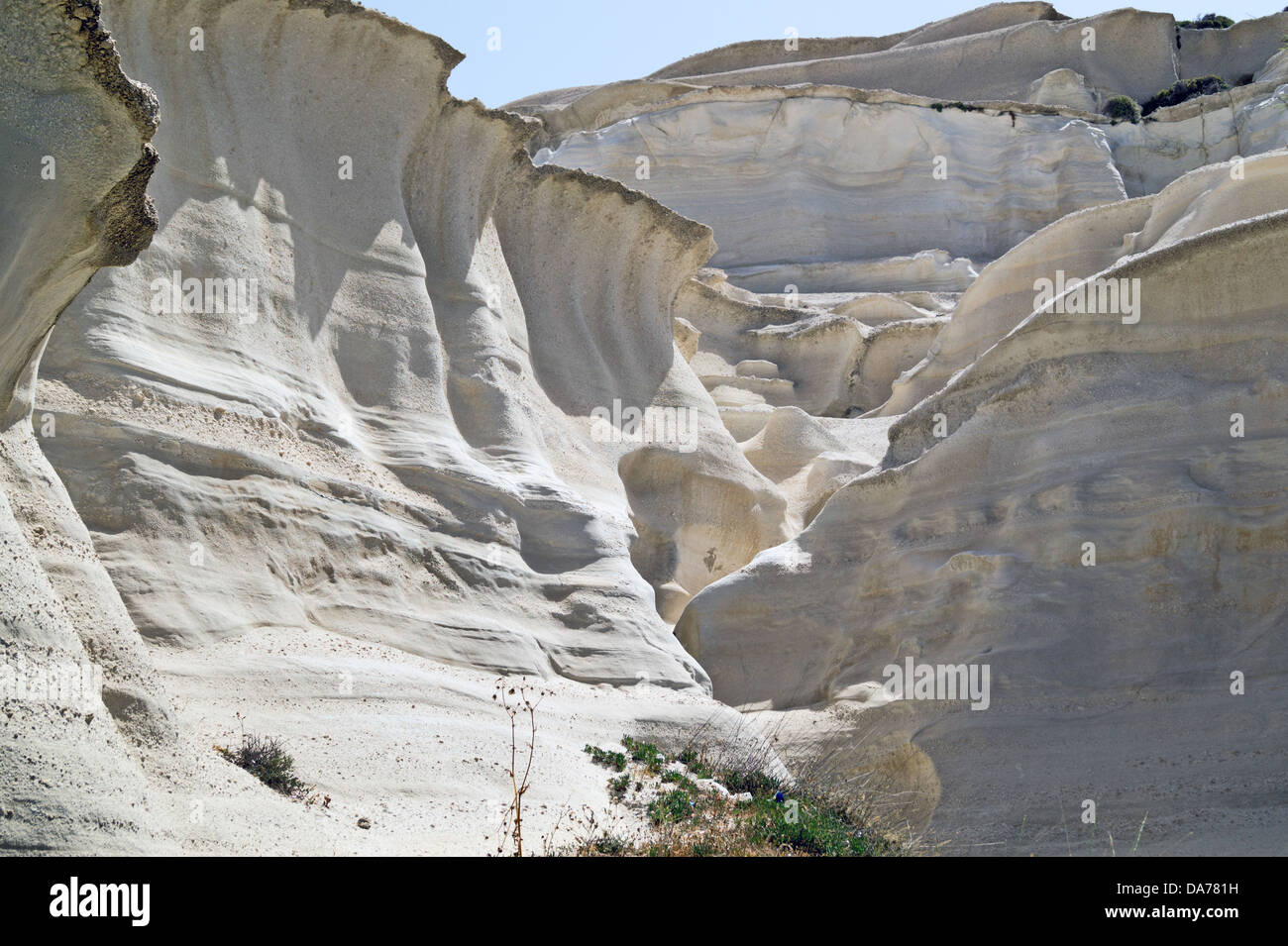 Caves and rock formations by the sea at Sarakiniko area on Milos island,a Greece Stock Photo
