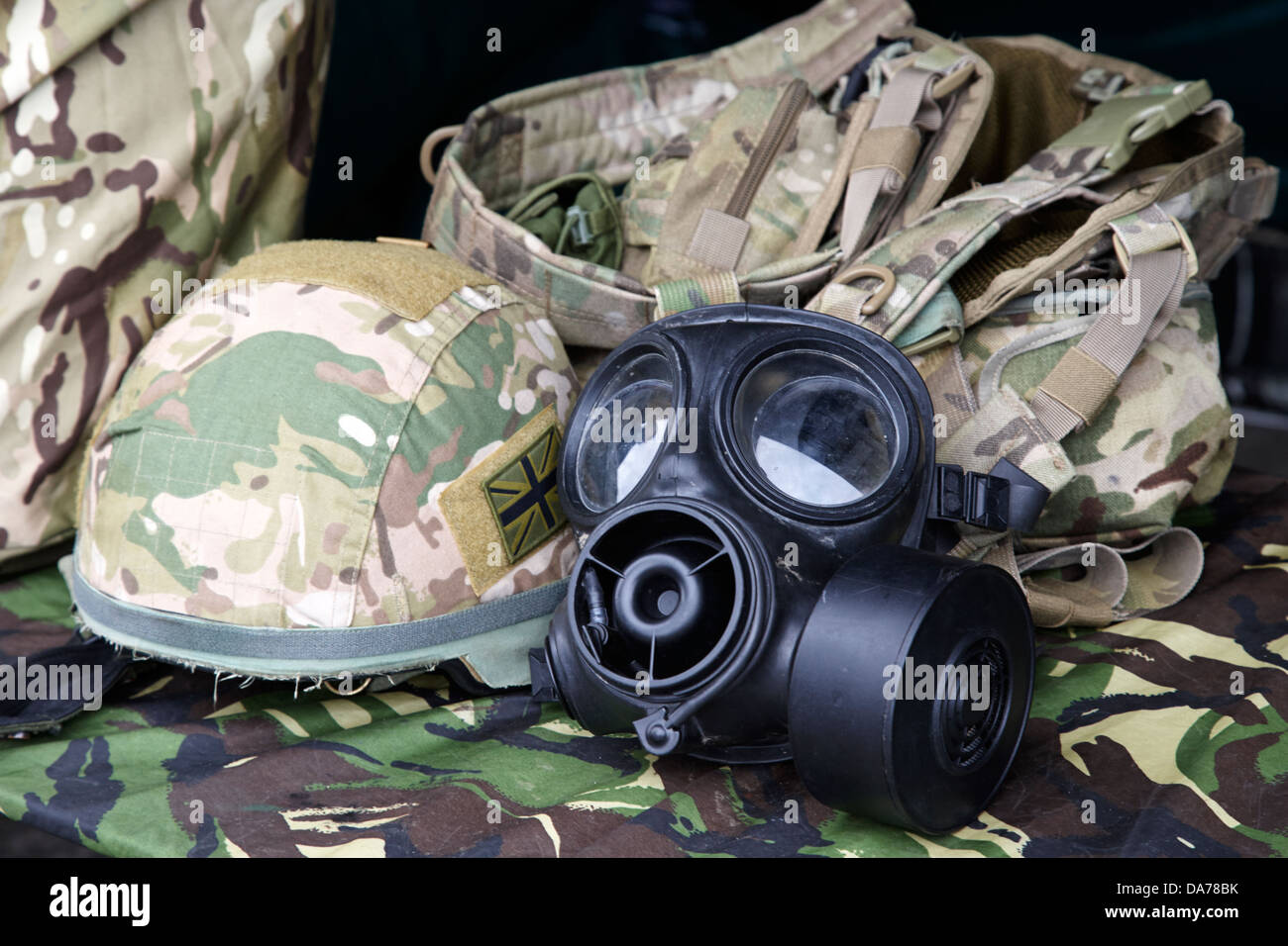 british army military equipment including helmet backpack and gas mask county down northern ireland uk Stock Photo