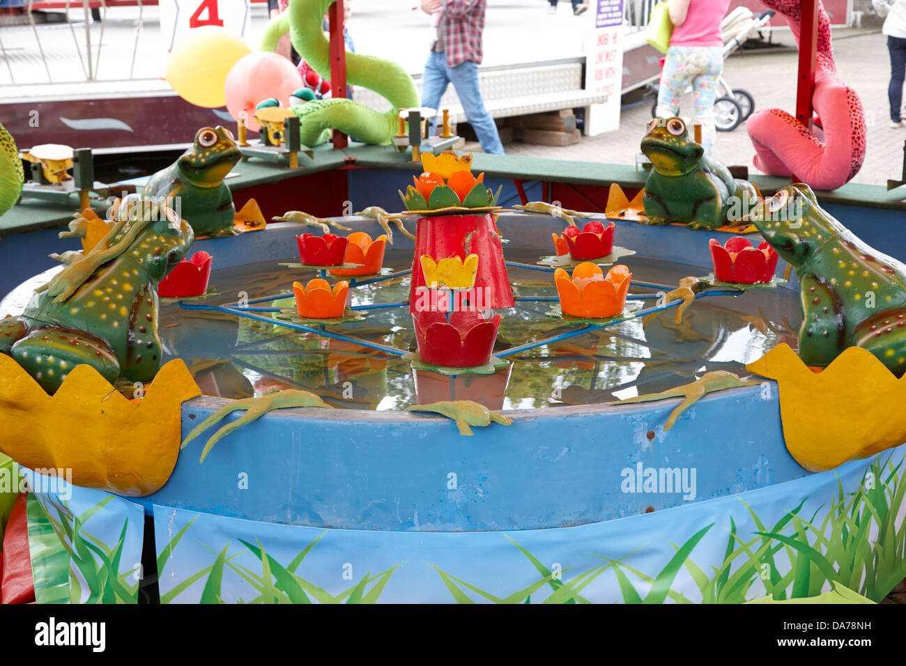 funfair skill game throw ball into pails county down northern ireland