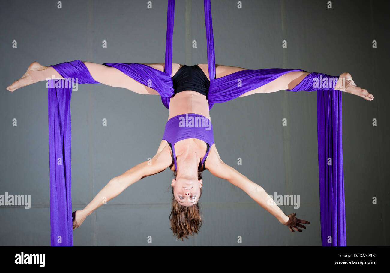 Gymnast performing aerial exercises Stock Photo