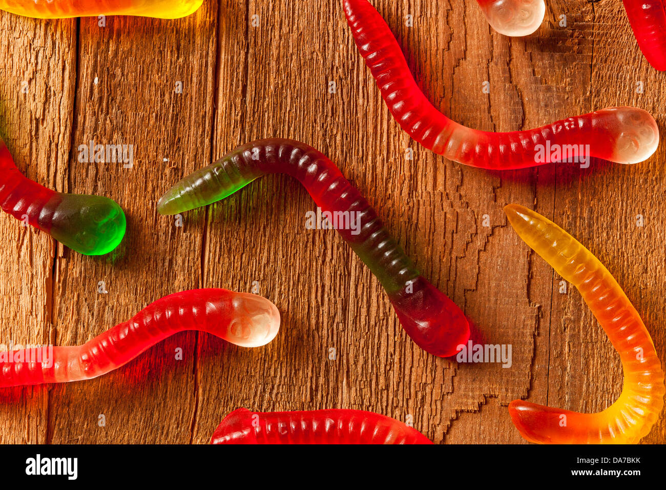 Colorful Fruity Gummy Worm Candy on a background Stock Photo