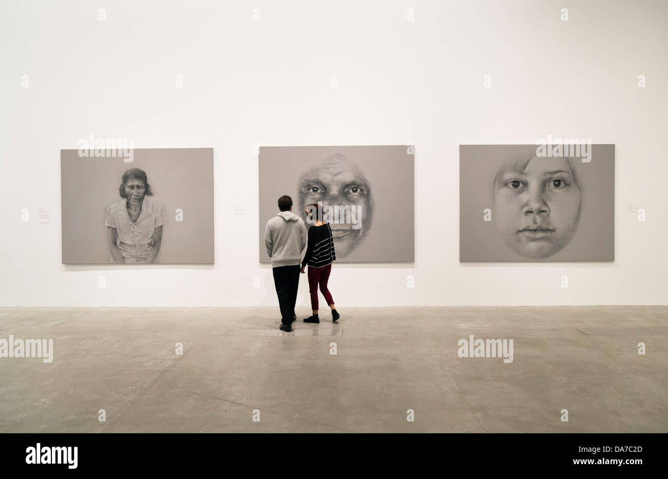 Visitors looking at paintings in Gallery of Modern Art or GoMA on Southbank n Brisbane Queensland Australia Stock Photo