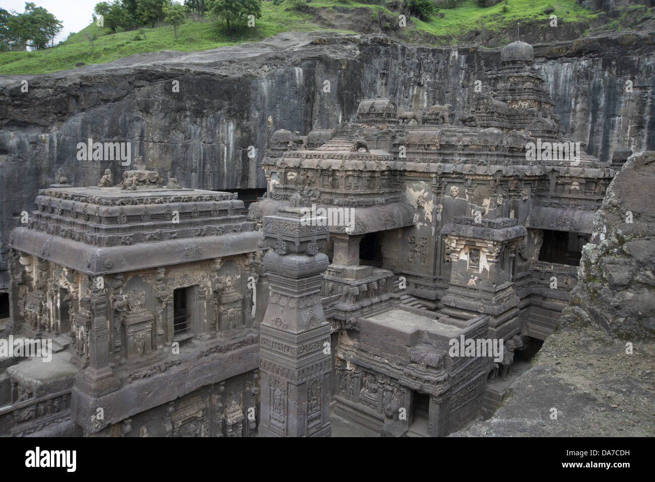Cave No 16 : View from South showing the Nandi Mandapa, the Dhvaja stamba and the Goddess chapel at the background. Ellora Stock Photo