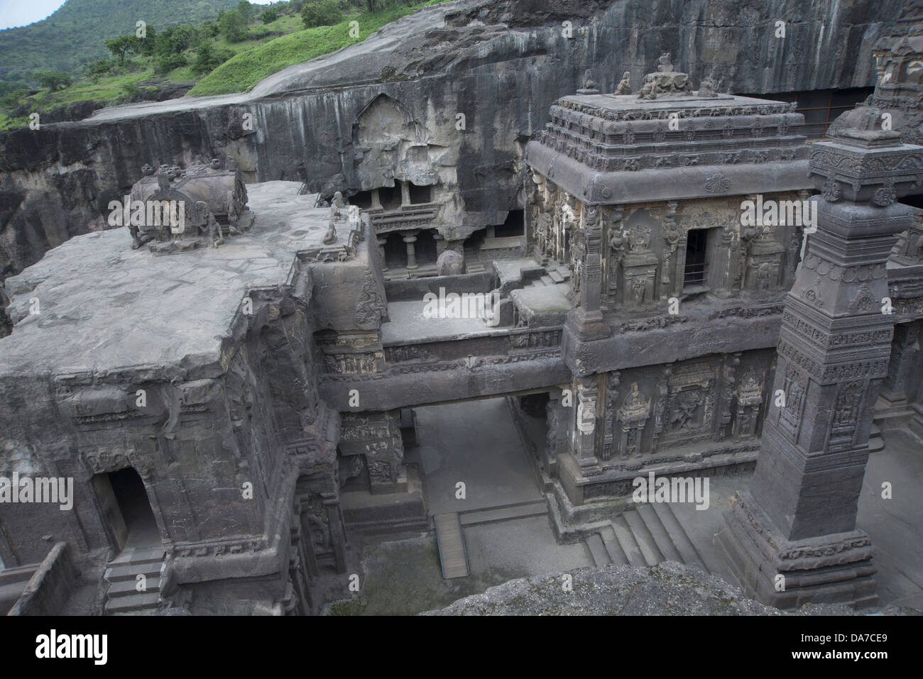 Cave No 16 : View from South showing the Nandi Mandapa, the Dhvaja stamba and the Goddess chapel at the background. Ellora Caves Stock Photo