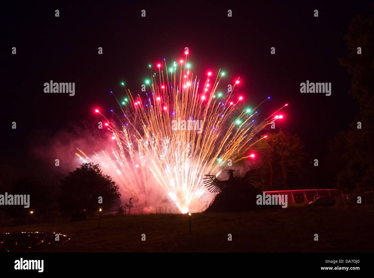 Bonfire and fireworks display opening the Glastonbury Festival 2013, Somerset, England, United Kingdom. Stock Photo