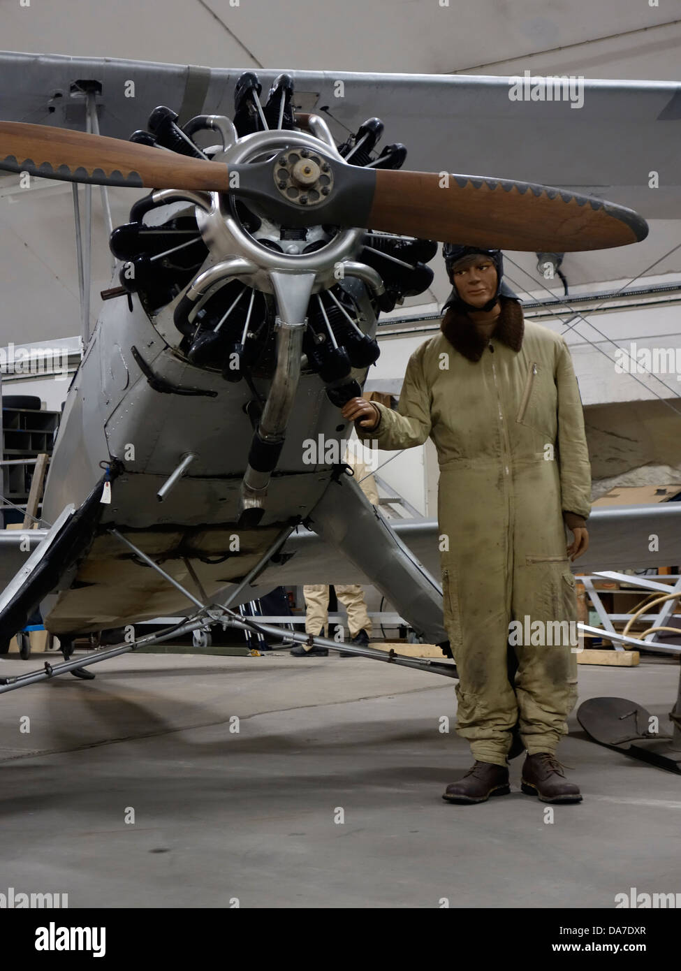 Dummy model aviator and old German biplane machine with Siemens-Halske Sh 14 radial engine. Stock Photo