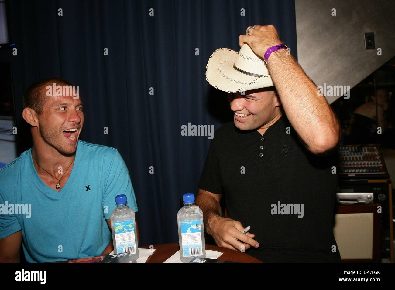 Las Vegas, NV. 5th July, 2013. Donald 'Cowboy' Cerrone, Cain Velasquez at arrivals for UFC Fight Week Pre-Fight Party for MMA Fans, Lagasse's Stadium at The Palazzo Resort Hotel Casino, Las Vegas, NV July 5, 2013. Credit:  James Atoa/Everett Collection/Alamy Live News Stock Photo