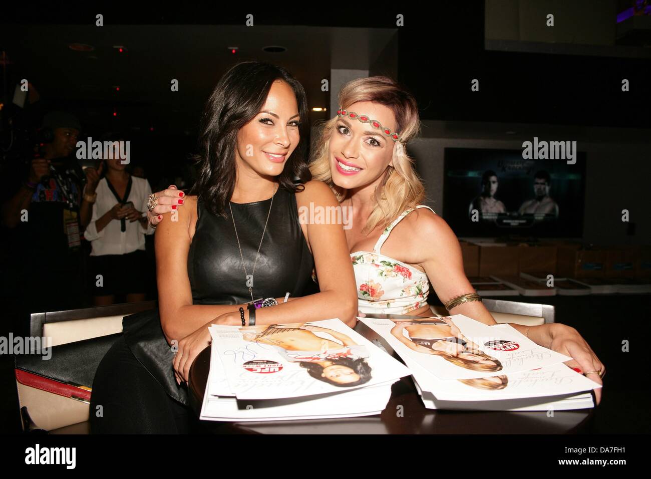 Las Vegas, NV. 5th July, 2013. Kenda Perez, Rachelle Leah at arrivals for UFC Fight Week Pre-Fight Party for MMA Fans, Lagasse's Stadium at The Palazzo Resort Hotel Casino, Las Vegas, NV July 5, 2013. Credit:  James Atoa/Everett Collection/Alamy Live News Stock Photo