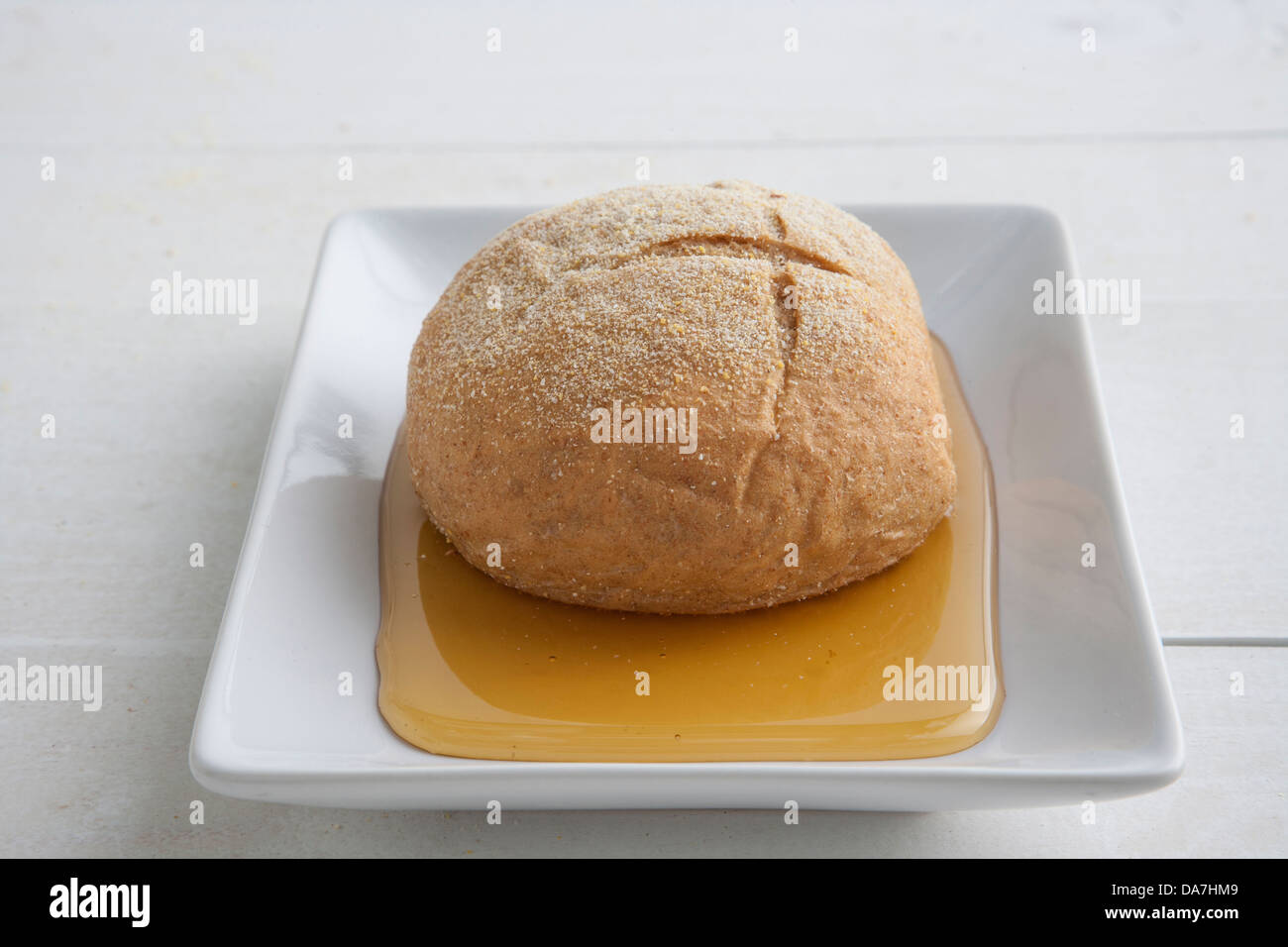 homemade loaf of bread and olive oil Stock Photo