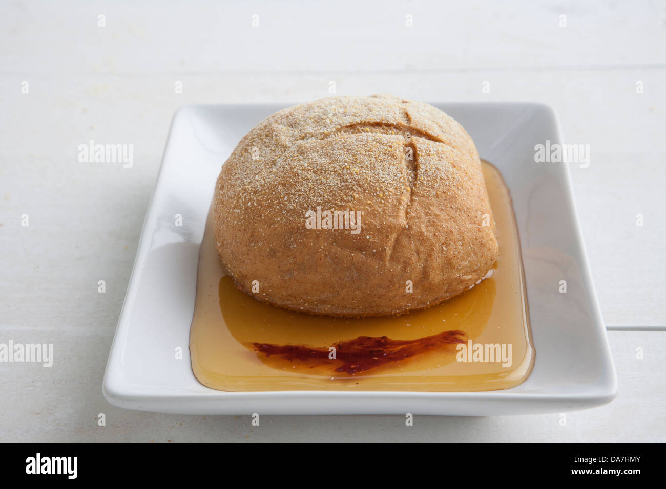 homemade loaf of bread and olive oil Stock Photo