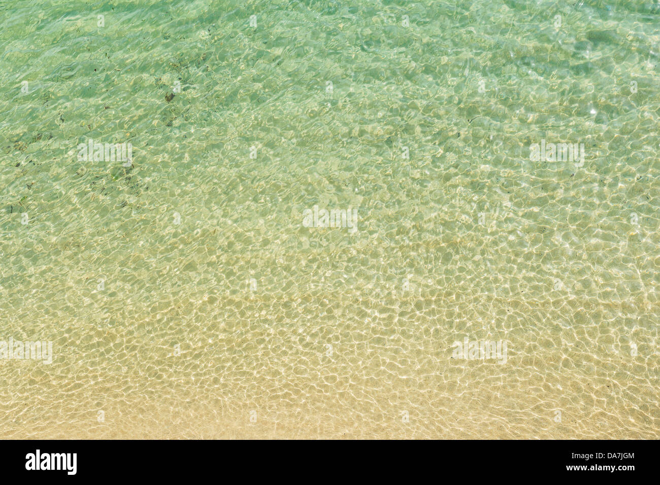 Shallow clear blue green rippling waters at St. Ives, Cornwall, Southwest England. Stock Photo