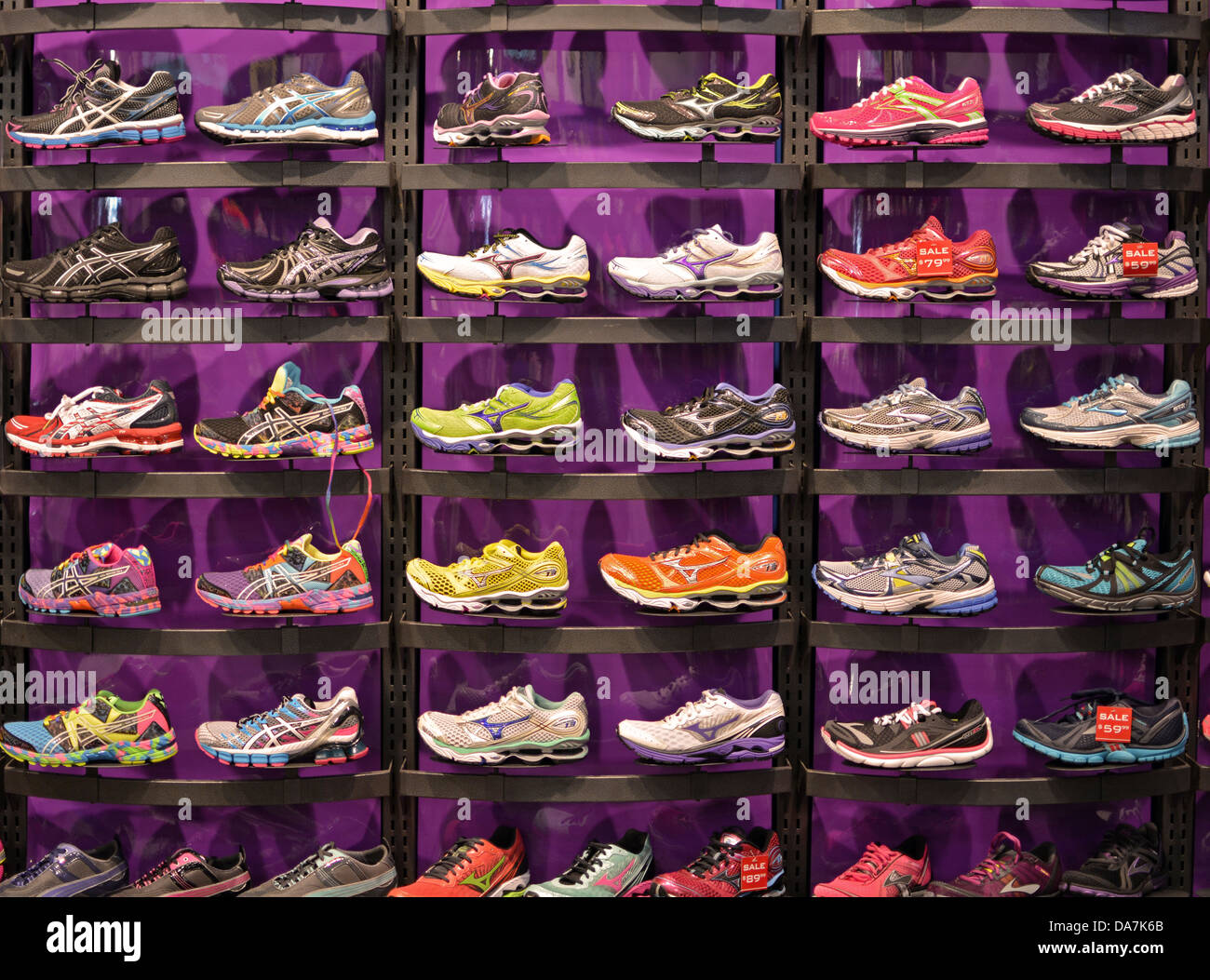 Men's athletic shoes for sale at a Foot Locker store on 14th Street in Downtown Manhattan, New York City Stock Photo