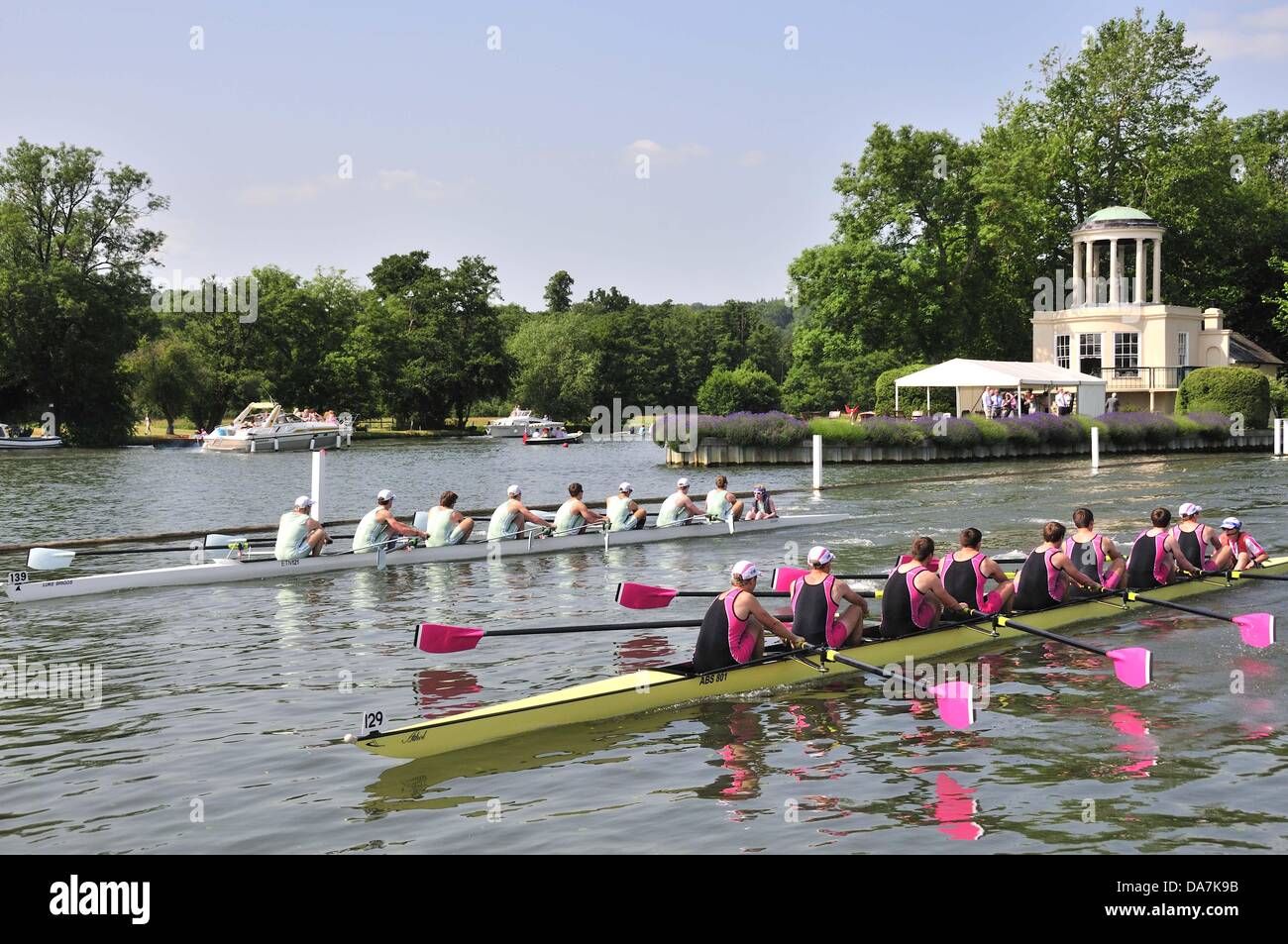 Henley on Thames, UK. 5th July, 2013. Henley Royal Regatta.  The Princess Elizabeth Challenge Cup (JM8+) start  passing  Temple Island behind Abingdon  School (1290 beat Eton College (1390 by 2 3/4 lengths to the finish on the 1/4 finals on Friday. Stock Photo