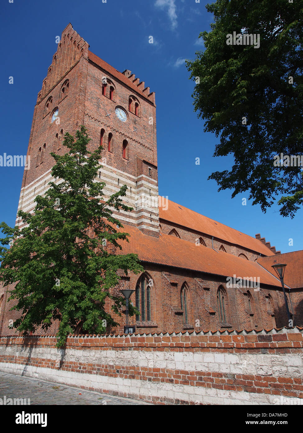 This photograph captures the exterior of a church in Køge, Denmark ...