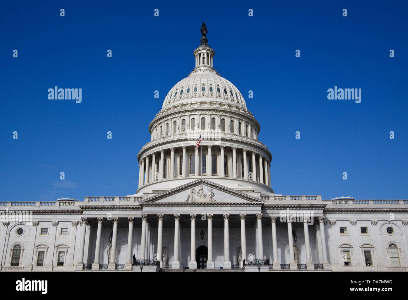 The US Capitol building in Washington, DC, as viewed from East Plaza; against a clear blue sky Stock Photo