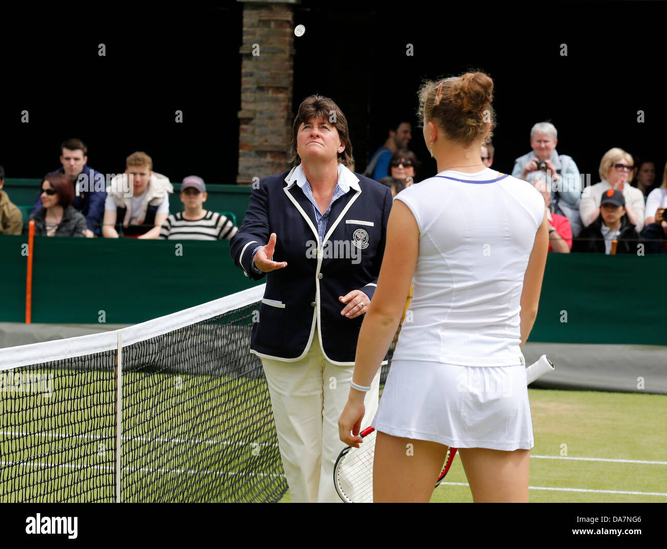 03.07.2013. Wimbledon,  London, England.  Day Nine of the The Wimbledon Tennis Championships 2013 held at The All England Lawn Tennis and Croquet Club, London, England, UK. Umpire tossing the coin before Katerina Siniakova( CZE) against Louisa Chirico i( USA ) Stock Photo