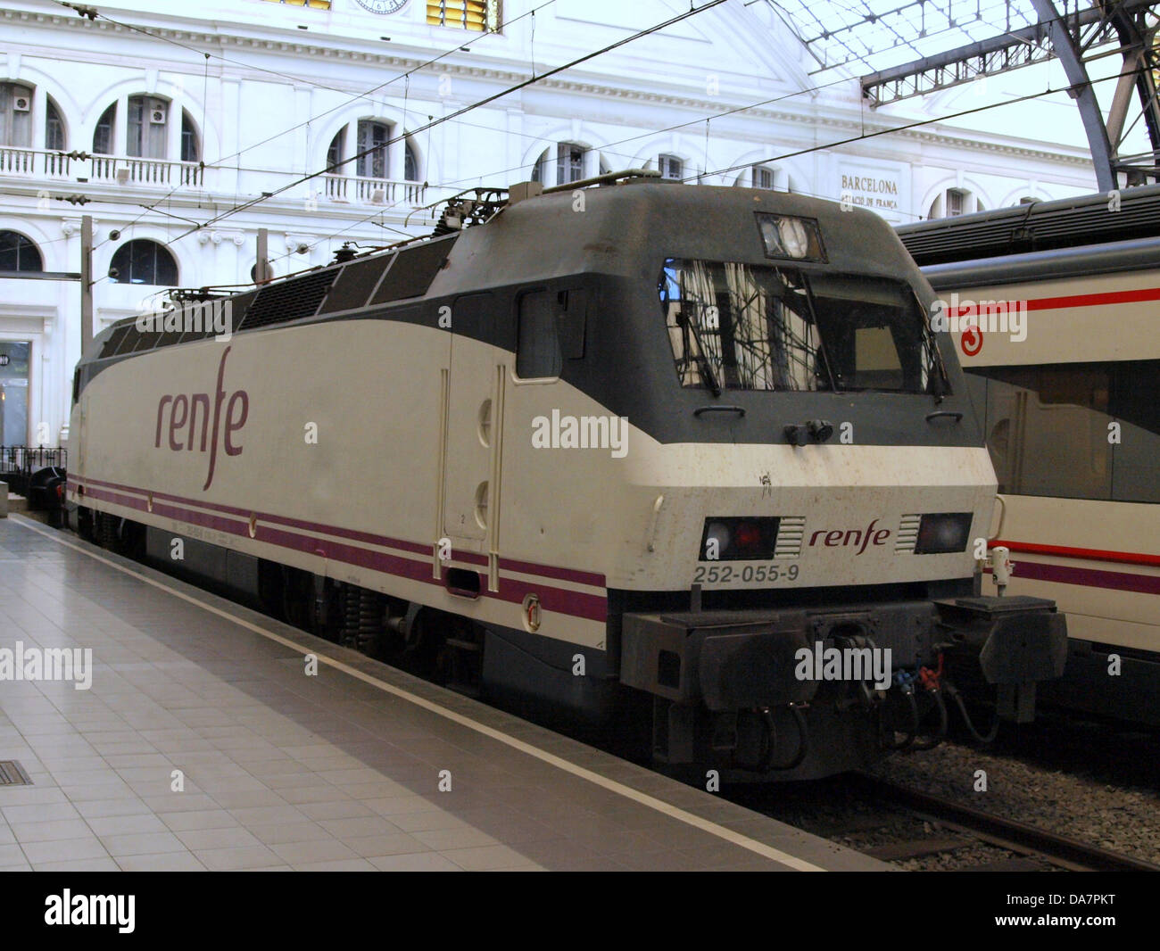 The Renfe 252-055-9 is an electric locomotive used by the Spanish railway network. This image captures the locomotive in action, showcasing its design and operational capabilities as it operates in the Barcelona area, reflecting Spain’s commitment to modern railway infrastructure and transportation. Stock Photo
