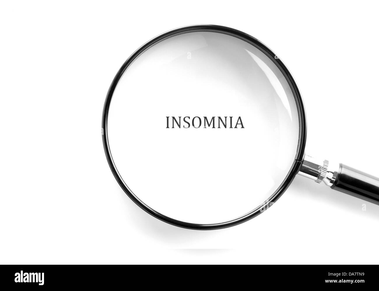 Concept photo showing the word insomnia with magnifying glass over it Stock Photo