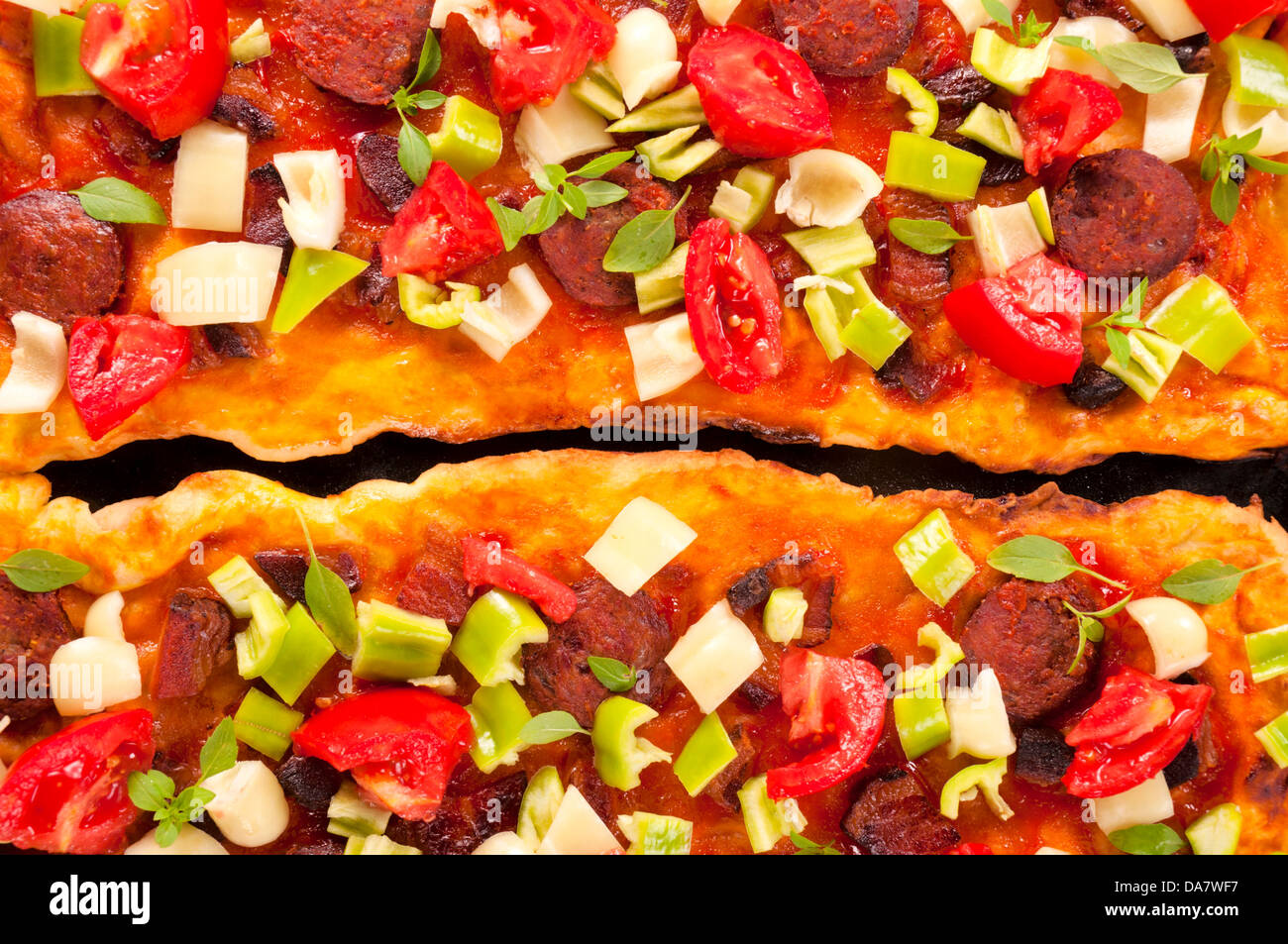 Full frame pizza toping from above as the background Stock Photo