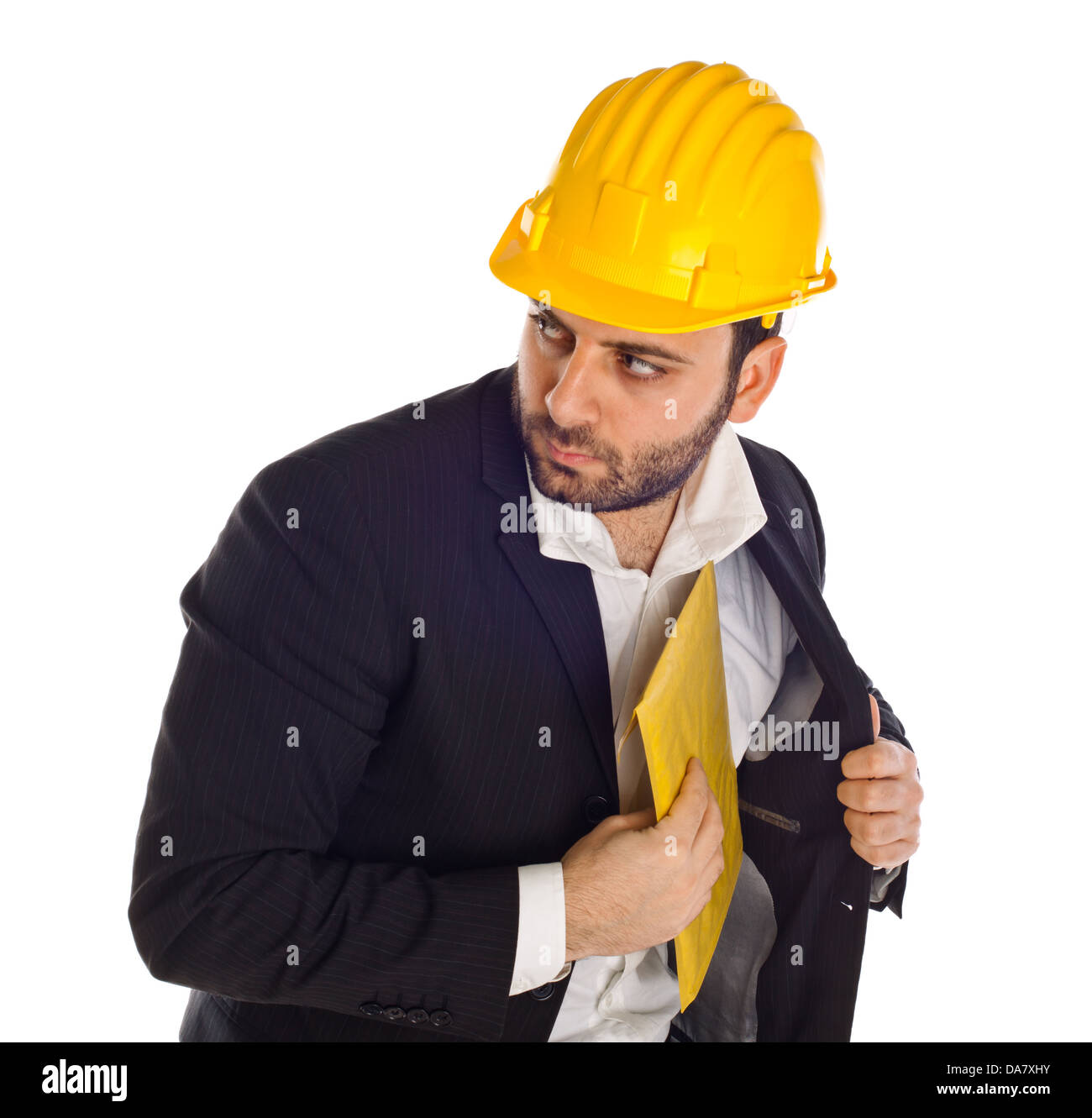Businessman with construction helmet and bribe isolated on white background Stock Photo