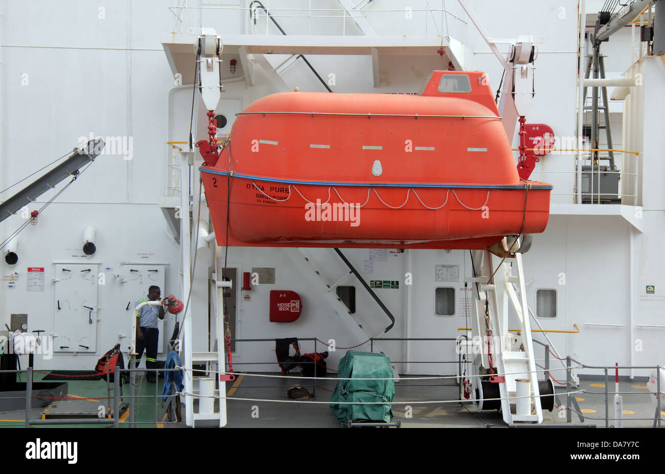 Orange lifeboat on a cargo ship Stock Photo Alamy