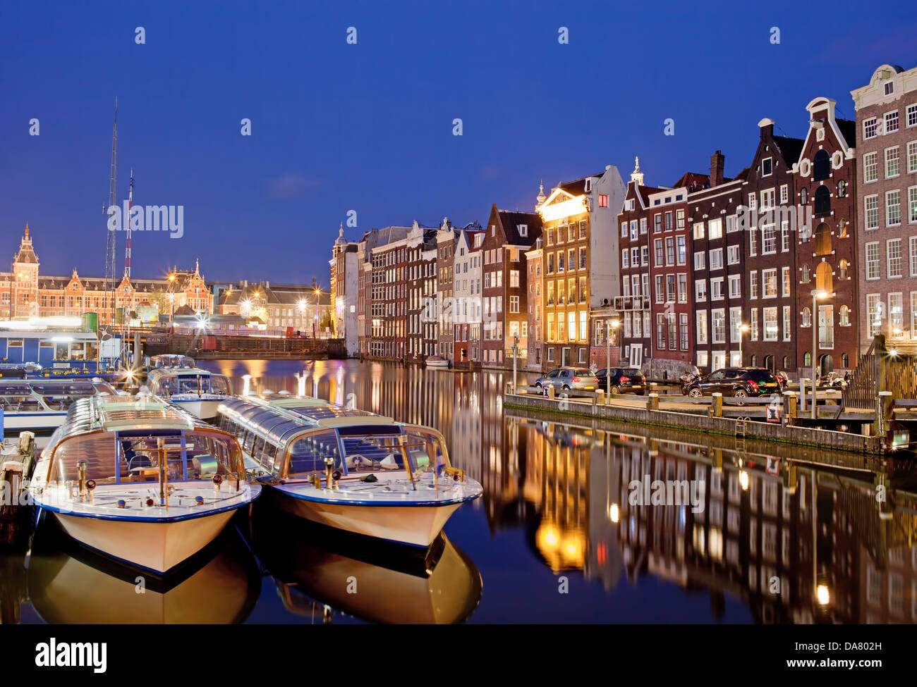 City of Amsterdam in Netherlands at night, historic ...