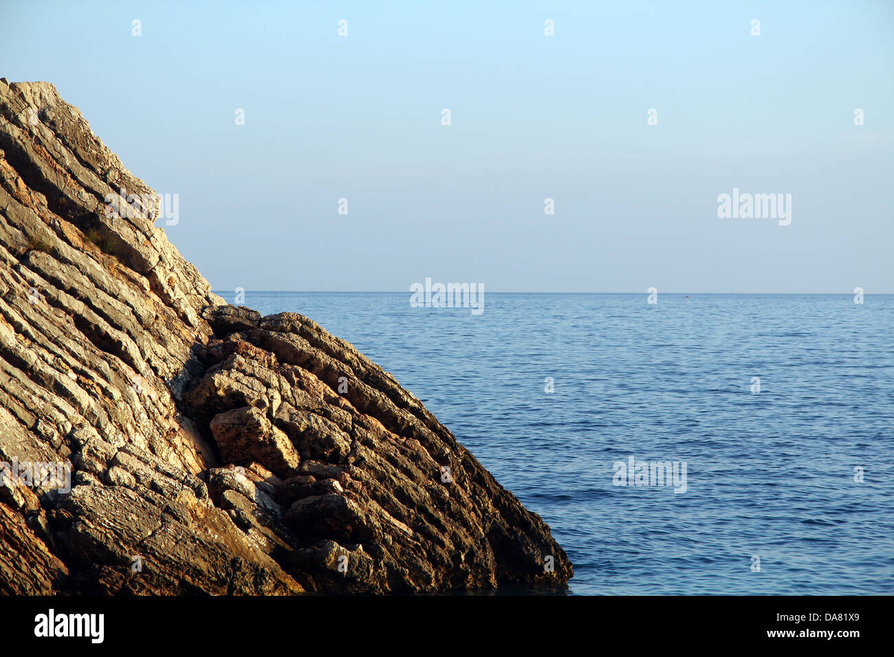 Old cliff on the coast of Adriatic see in Montenegro. Stock Photo