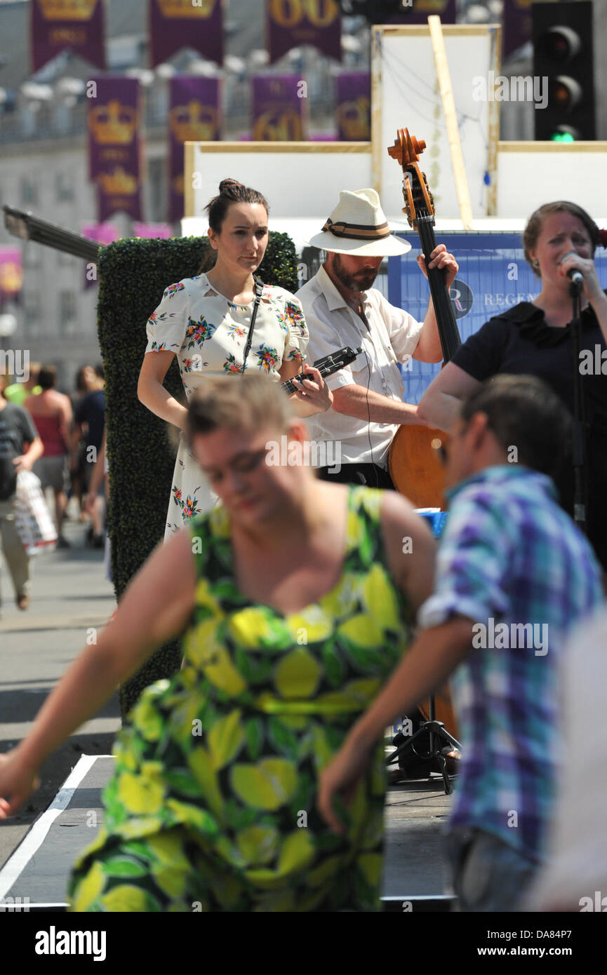 Regent Street, London, UK. 7th July 2013. People dance the jive to a 1940s band at the Regent Street event on the hottest day of the year. Credit:  Matthew Chattle/Alamy Live News Stock Photo