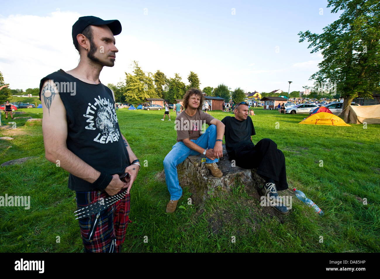 Goniadz, Poland - July 7th, 2013 - A two-day event called The Swamp Rock Fest (Rock na bagnie) arranged in the middle of wetlands in North-Eastern Poland attracted tens of punk rock groups and hundreds of their devotees. This working-class subculture, orignating from the 1970s, is gaining ground in certain countries due to high unemployment figures. Stock Photo
